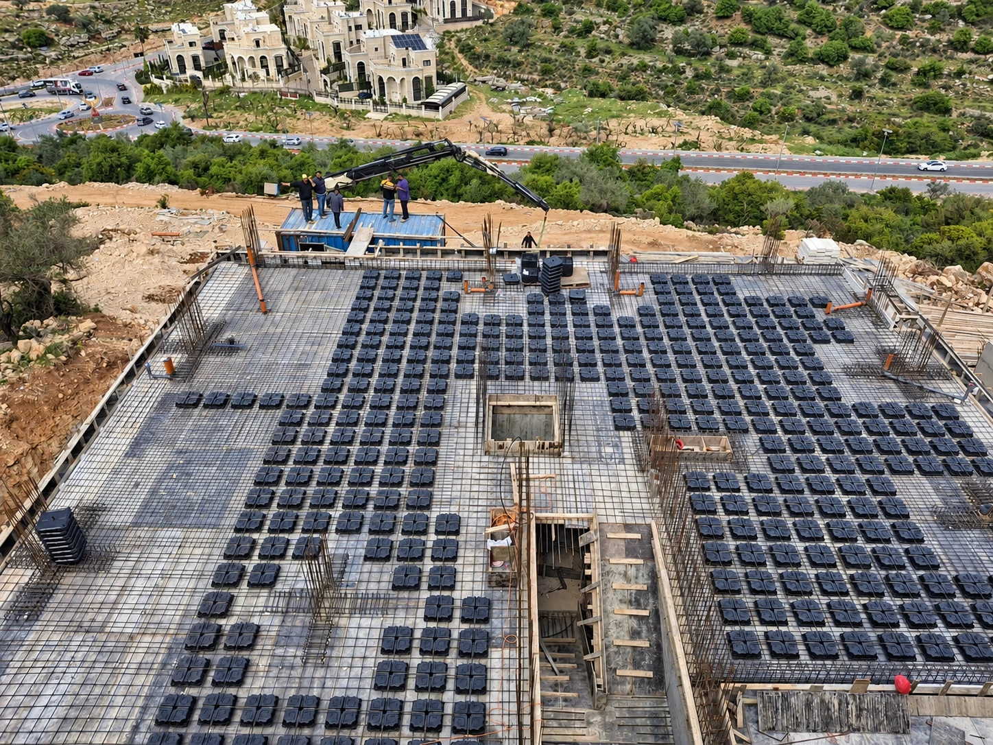 Voided slab construction with reinforcement steel and void formers at a Max Span project