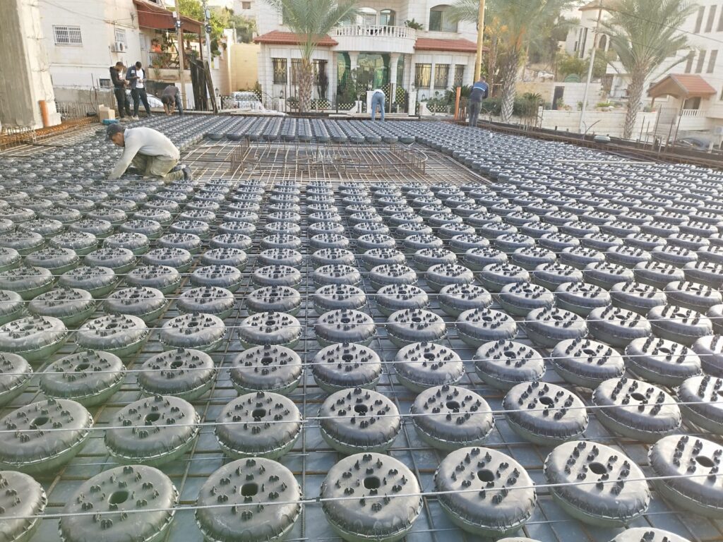 Foermli voided slab system installation on a construction site